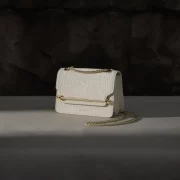 White croc-embossed Strathberry handbag with gold chain strap, part of the 2025 Edinburgh sample sale selection.