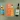 Bottles of Bruadar, Old Perth Amontillado, and Mac-Talla Terra whisky on green background