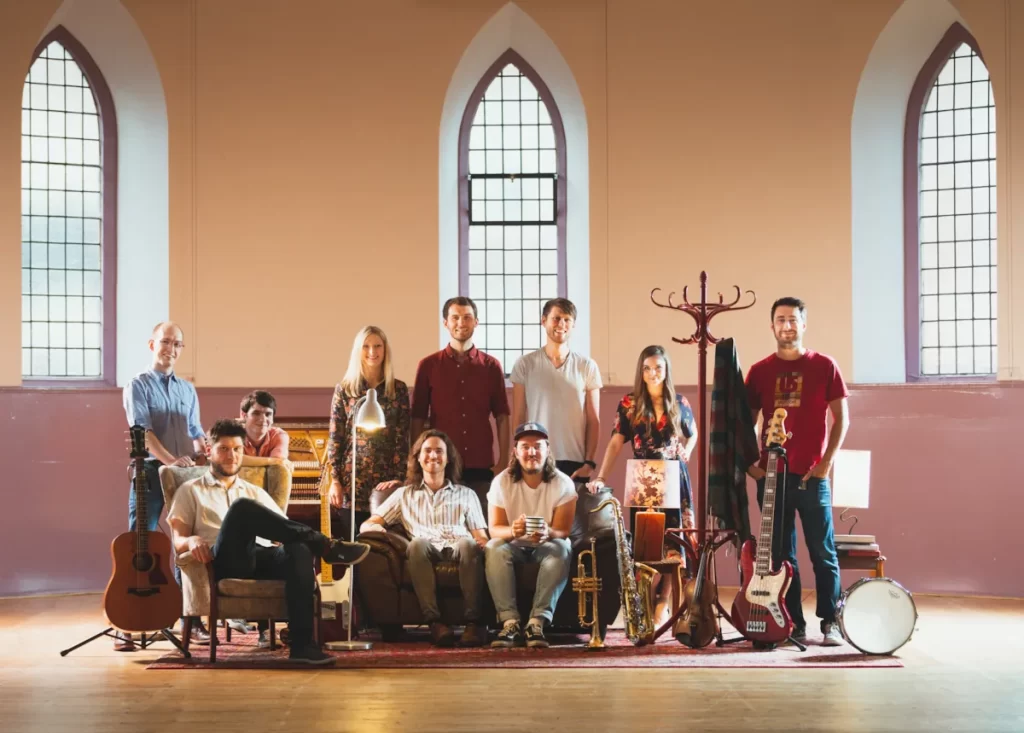 Fat-Suit on stage surrounded by instruments in Òran Mór
