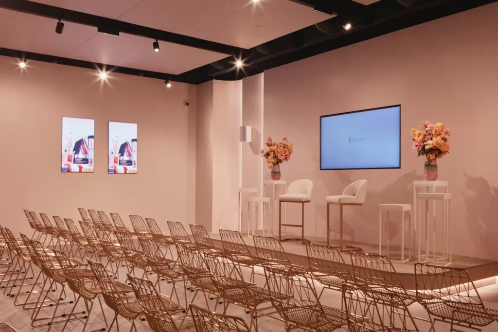 H beauty masterclass seating area with blush tones, gold chairs, and floral displays at Silverburn Glasgow