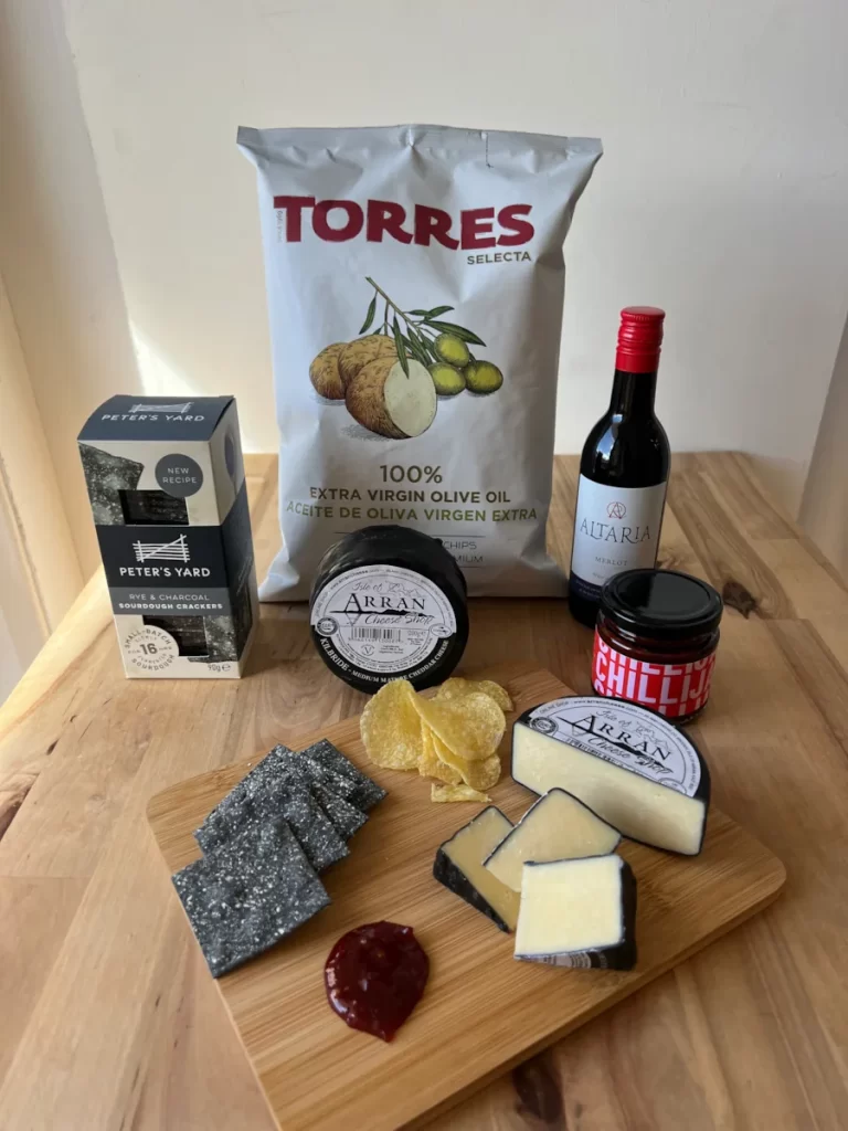 Crunch Platters gift box with crackers, crisps, chutney, cheese and red wine.