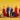 Six women brewers from Scotland pose in bold red, blue and yellow outfits with beer barrels and glasses, marking Lidl’s gender-balanced beer aisle initiative.
