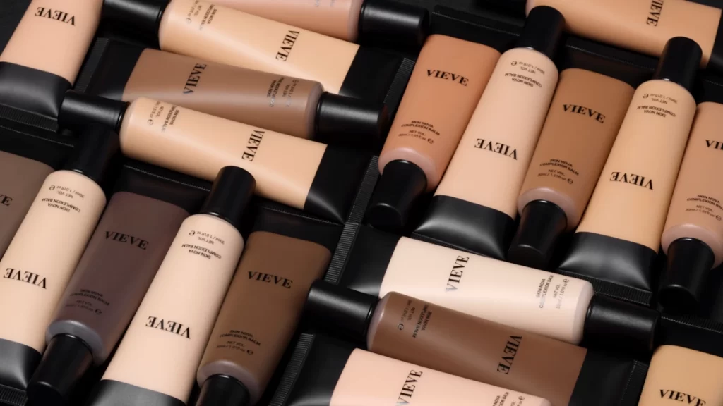 VIEVE Skin Nova Complexion Balm tubes in multiple shades laid out side by side.