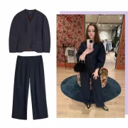 River Island navy pinstripe cocoon-sleeve blazer and matching low-waist trousers styled with pointed heels and a black feather bag, perfect for autumn layering.