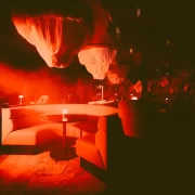 Red-lit interiors at Somewhere by Nico, Byres Road Glasgow, styled for The House of Horrors Halloween cocktail experience running until 2 November 2025.
