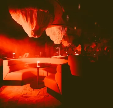Red-lit interiors at Somewhere by Nico, Byres Road Glasgow, styled for The House of Horrors Halloween cocktail experience running until 2 November 2025.