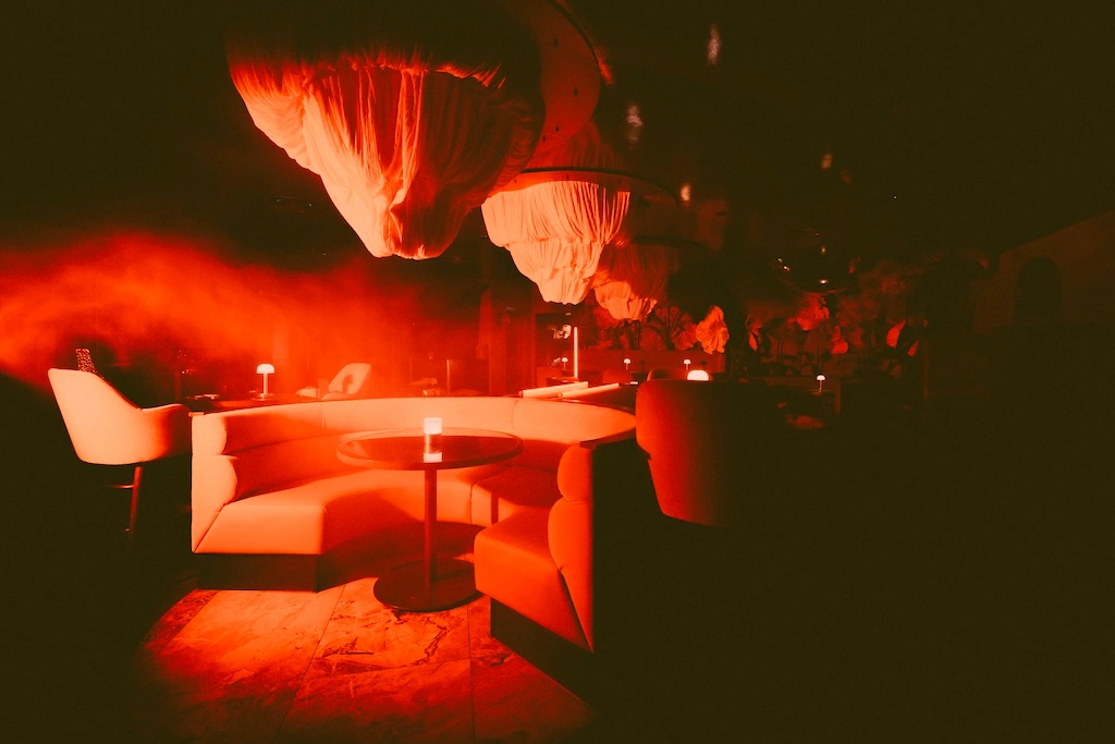 Red-lit interiors at Somewhere by Nico, Byres Road Glasgow, styled for The House of Horrors Halloween cocktail experience running until 2 November 2025.