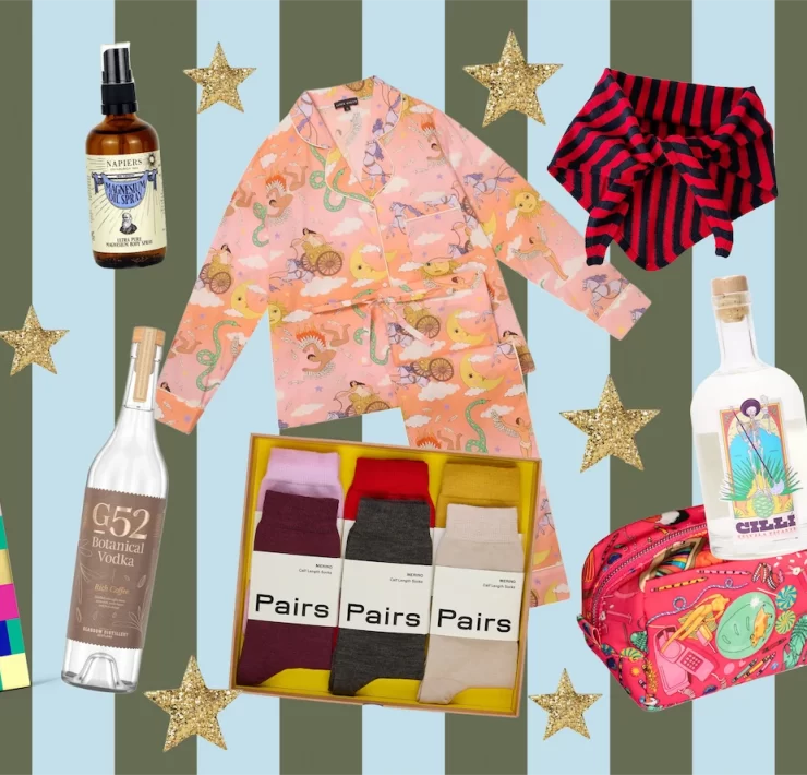 Festive collage of Christmas gift ideas including Oir festive soap, Napiers magnesium oil spray, Karen Mabon pyjamas, La Fetiche striped neck scarf, C.Nicol red suede bag, BYOMA skincare set, G52 Botanical Vodka, Pairs luxury socks, Cillí Tequila Picante, Goat Rodeo seasonings, and a patterned 2025 diary, arranged on a striped background with gold stars.