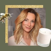 Portrait of Karen Young, founder of rae & daunder, alongside one of her clean-burning candles and a bee graphic, on a green and gold background.